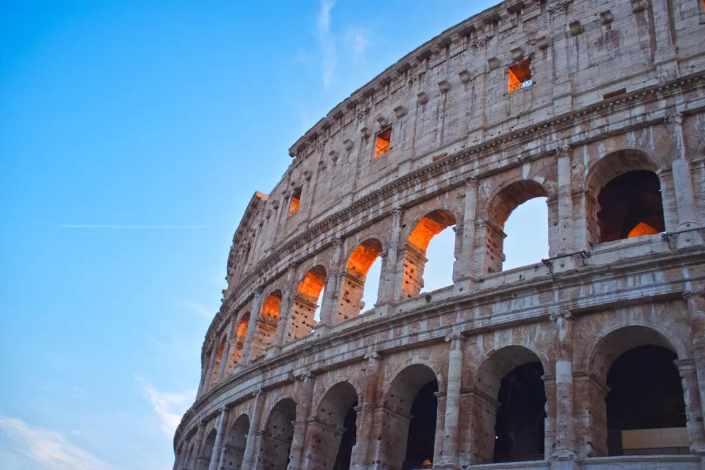 the coliseum of Rome at sunset